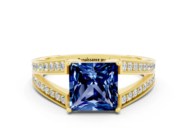 Yellow gold Princess Cut Blue Sapphire Split Shank Ring with Pavé Band and Four-Prong Setting