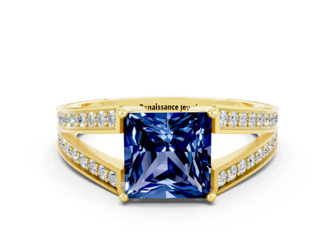 Yellow gold Princess Cut Blue Sapphire Split Shank Ring with Pavé Band and Four-Prong Setting