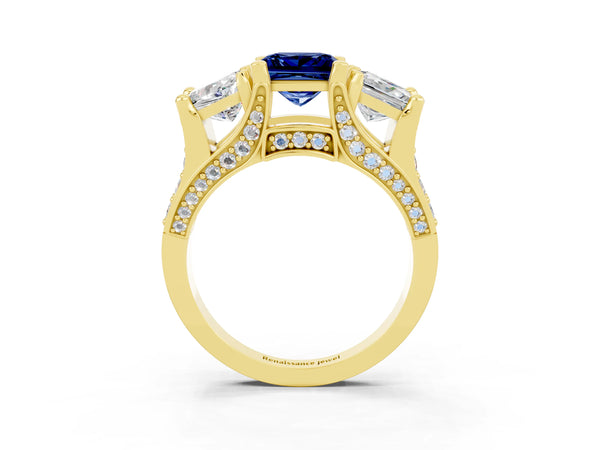 Yellow gold Princess Cut Blue Sapphire Three-Stone Ring with Channel Set Band and Four-Prong Setting
