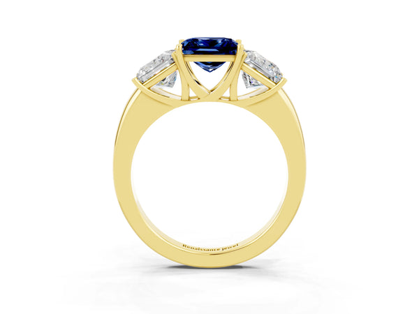 Yellow gold Princess Cut Blue Sapphire Three-Stone Ring with Four-Prong Setting and Classic Band