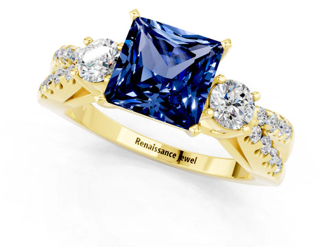 Yellow gold Princess Cut Blue Sapphire Three-Stone Ring with Pavé Split Shank and Four-Prong Setting_1