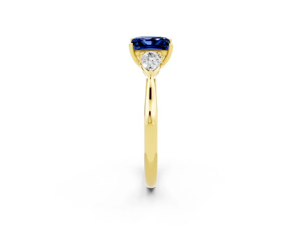 Yellow gold Princess Cut Blue Sapphire Three-Stone Ring with Pear  Side Stones and Prong Setting