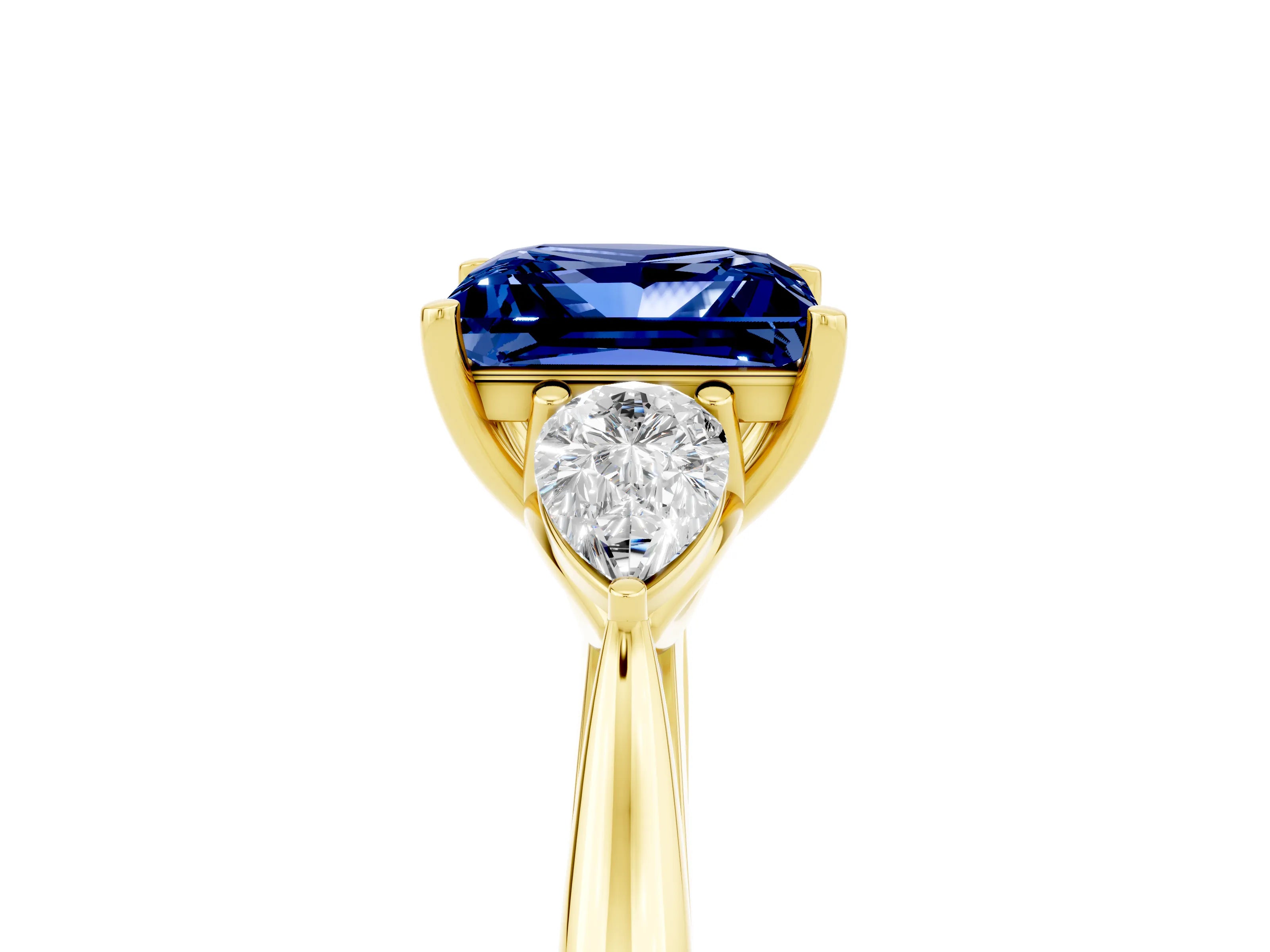 Yellow gold Princess Cut Blue Sapphire Three-Stone Ring with Pear Side Stones and Four-Prong Setting_17