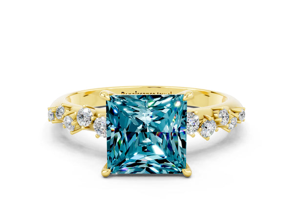 Yellow gold Princess Cut Blue Topaz Cluster Side Stone Solitaire Ring with Prong Setting