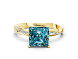 Yellow gold Princess Cut Blue Topaz Engagement Ring with Side Stone Accents and Four-Prong Setting_60