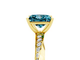 Yellow gold Princess Cut Blue Topaz Engagement Ring with Side Stone Accents and Four-Prong Setting_65