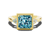 Yellow gold Princess Cut Blue Topaz Halo Ring with Tapered Band and Four-Prong Setting