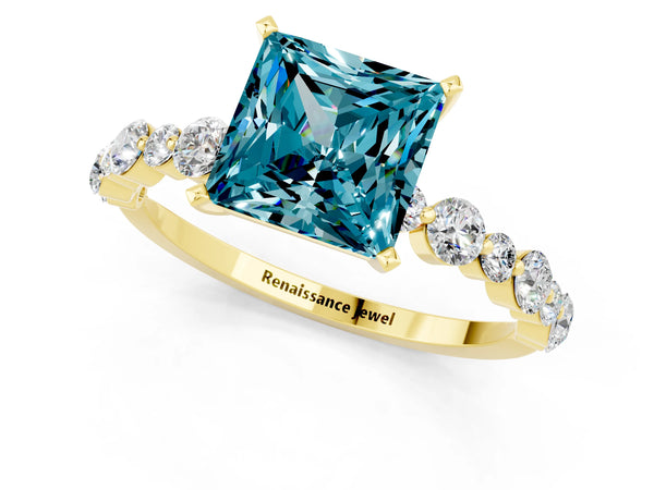 Yellow gold Princess Cut Blue Topaz Prong Set Engagement Ring with Pavé Band