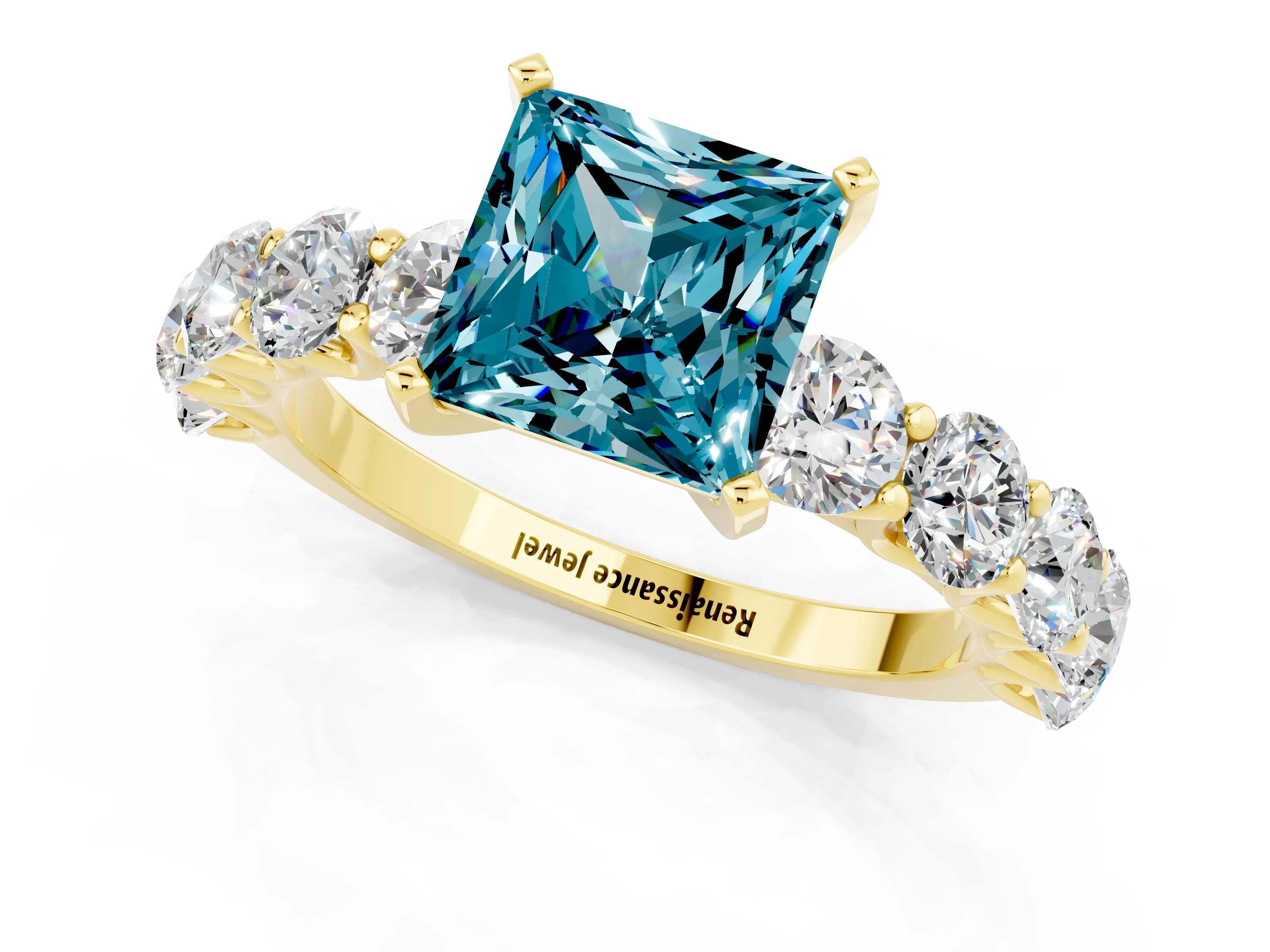 Yellow gold Princess Cut Blue Topaz Prong Setting with Side Stones on a Pave Band_1