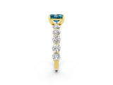 Yellow gold Princess Cut Blue Topaz Prong Setting with Side Stones on a Pave Band_2