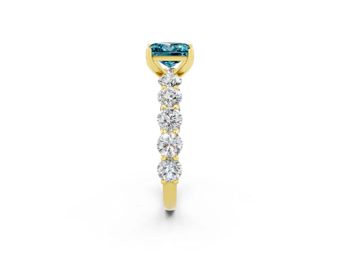 Yellow gold Princess Cut Blue Topaz Prong Setting with Side Stones on a Pave Band_2