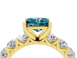 Yellow gold Princess Cut Blue Topaz Prong Setting with Side Stones on a Pave Band_4