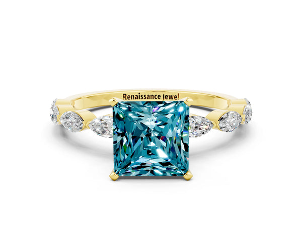 Yellow gold Princess Cut Blue Topaz Ring with Marquise Side Stones and Prong Setting