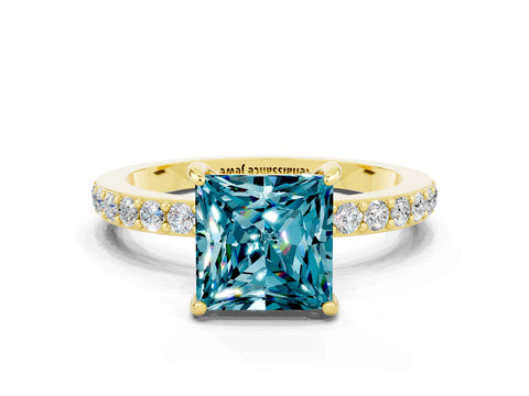 Yellow gold Princess Cut Blue Topaz Ring with Pavé Band and Four-Prong Setting