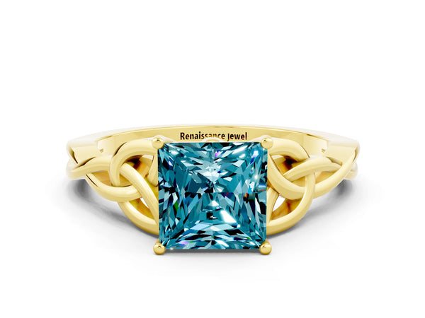 Yellow gold Princess Cut Blue Topaz Solitaire Engagement Ring with Celtic Knot Band and Four-Prong Setting