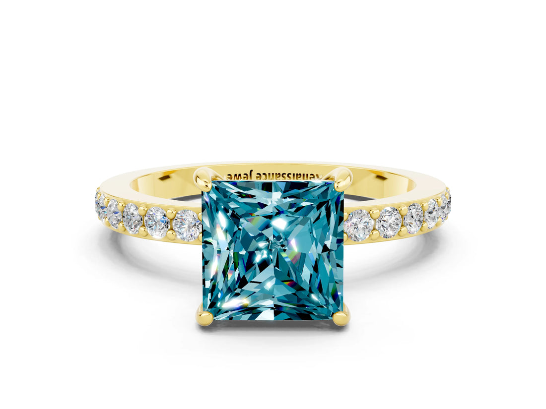 Yellow gold Princess Cut Blue Topaz Solitaire Engagement Ring with Pavé Band and Four-Prong Setting