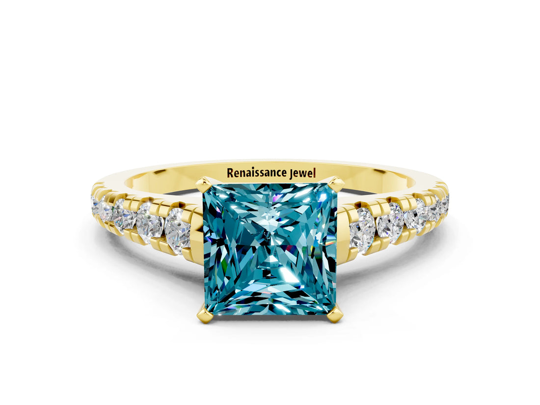 Yellow gold Princess Cut Blue Topaz Solitaire Ring with Cathedral Setting and Pavé Band
