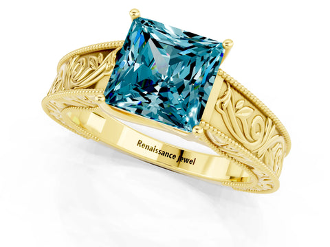 Yellow gold Princess Cut Blue Topaz Solitaire Ring with Engraved Band and Four-Prong Setting_1