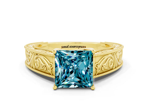 Yellow gold Princess Cut Blue Topaz Solitaire Ring with Engraved Band and Four-Prong Setting