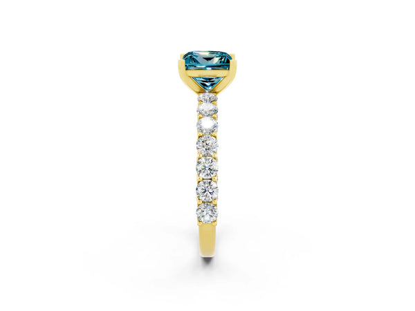 Yellow gold Princess Cut Blue Topaz Solitaire Ring with Shared Prong Pavé Band and Four-Prong Setting