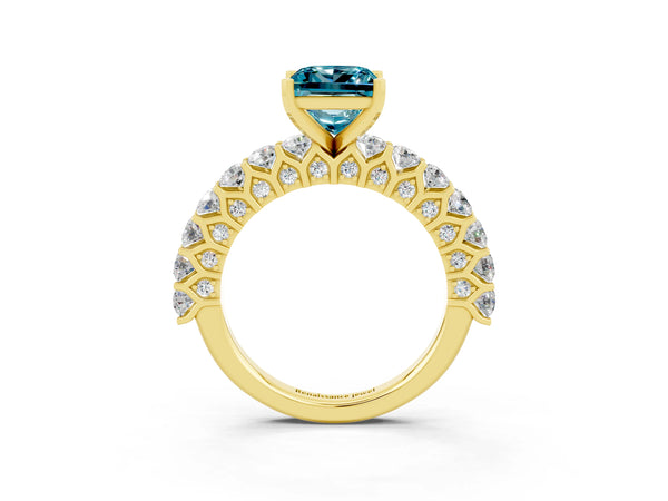 Yellow gold Princess Cut Blue Topaz Solitaire Ring with Shared Prong Pavé Band and Four-Prong Setting