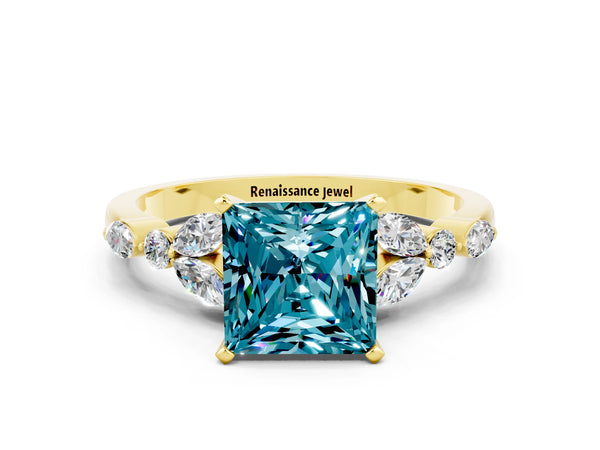Yellow gold Princess Cut Blue Topaz Solitaire Ring with Side Stones and Four-Prong Setting