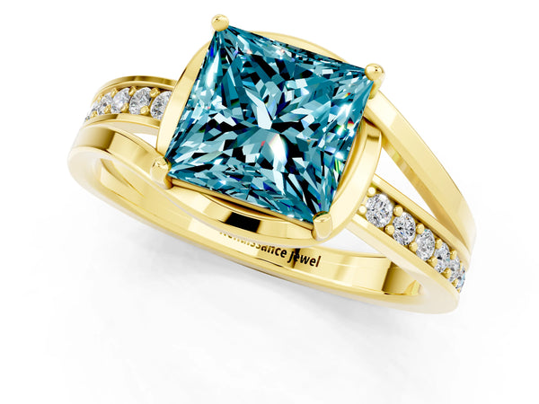 Yellow gold Princess Cut Blue Topaz Solitaire Ring with Split Shank and Prong Setting