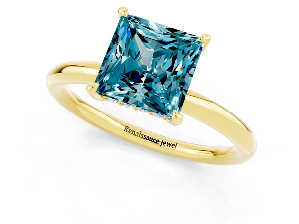 Yellow gold Princess Cut Blue Topaz Solitaire Ring with Thin Band and Four-Prong Setting