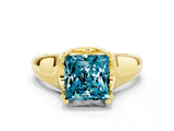 Yellow gold Princess Cut Blue Topaz Solitaire Ring with Wide Band and Prong Setting