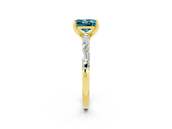 Yellow gold Princess Cut Blue Topaz Solitaire with Side Baguettes and Channel Set Band