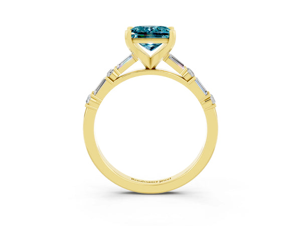 Yellow gold Princess Cut Blue Topaz Solitaire with Side Baguettes and Channel Set Band