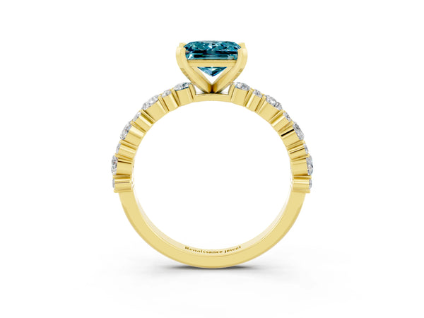 Yellow gold Princess Cut Blue Topaz Side Stone Solitaire Ring with Round  and Four-Prong Setting