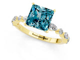 Yellow gold Princess Cut Blue Topaz Solitaire with Side Stones on a Pavé Band and Four-Prong Setting_1