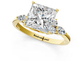 Yellow gold Princess Cut Brilliant Diamond Solitaire Ring with Pear Side Stones and Four-Prong Setting_4