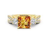 Yellow gold Princess Cut Citrine Three-Stone Ring with Pavé Split Shank and Four-Prong Setting