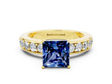 Yellow gold Princess Cut Cut Channel Set Diamond Engagement Ring with Four-Prong Setting