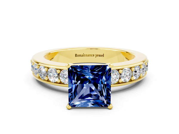 Yellow gold Princess Cut Blue Sapphire Engagement Ring with Channel Set Round  Band and Prong Setting