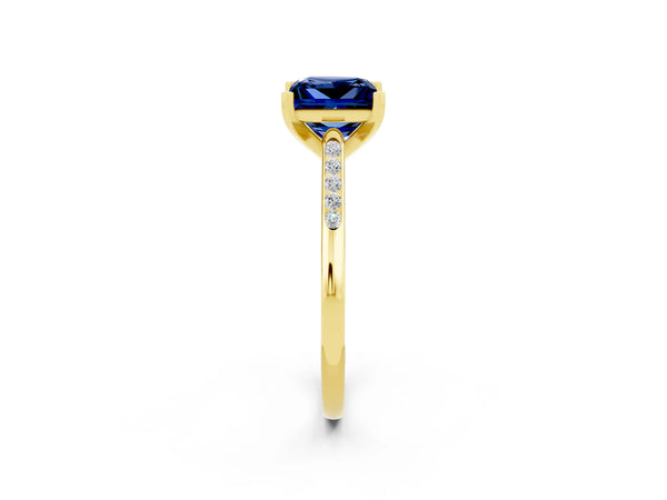 Yellow gold Princess Cut Blue Sapphire Solitaire Ring with Channel Set Round Band and Prong Setting