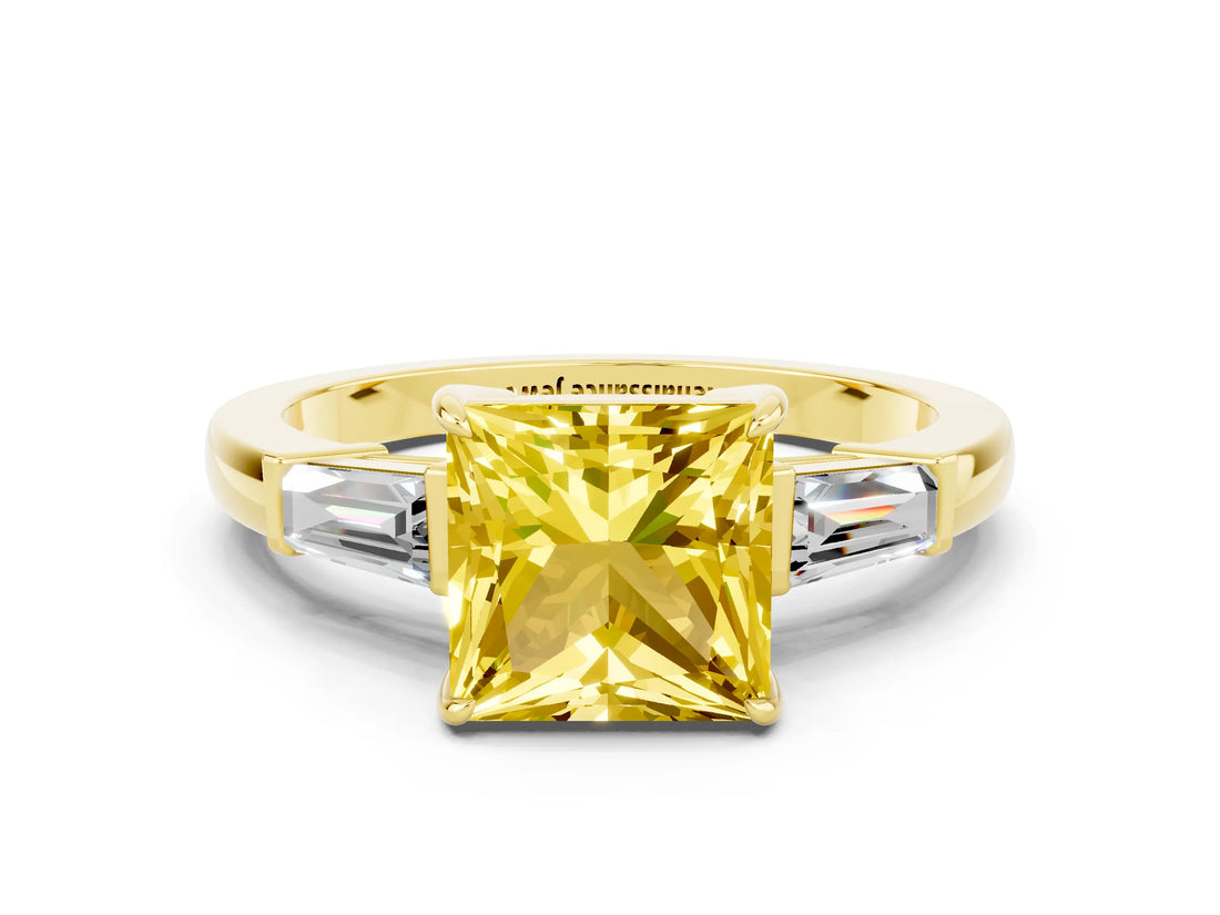 Yellow gold Princess Cut Cut Diamond Ring with Tapered Baguette Side Stones in Four-Prong Setting