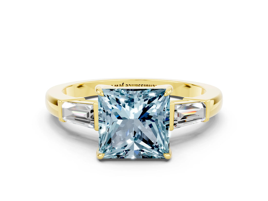 Yellow gold Princess Cut Cut Diamond Ring with Tapered Baguette Side Stones in Four-Prong Setting