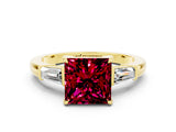 Yellow gold Princess Cut Cut Diamond Ring with Tapered Baguette Side Stones in Four-Prong Setting
