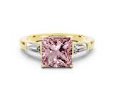 Yellow gold Princess Cut Cut Diamond Ring with Tapered Baguette Side Stones in Four-Prong Setting