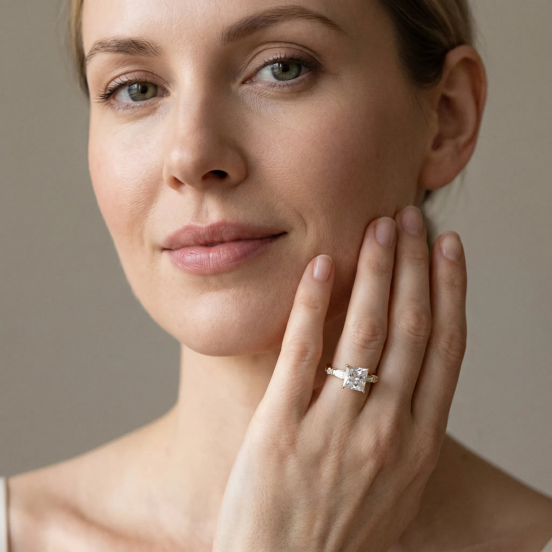 Yellow gold Princess Cut Diamond Ring with Baguette Side Stones, Channel Set Band, and Four-Prong Setting_44