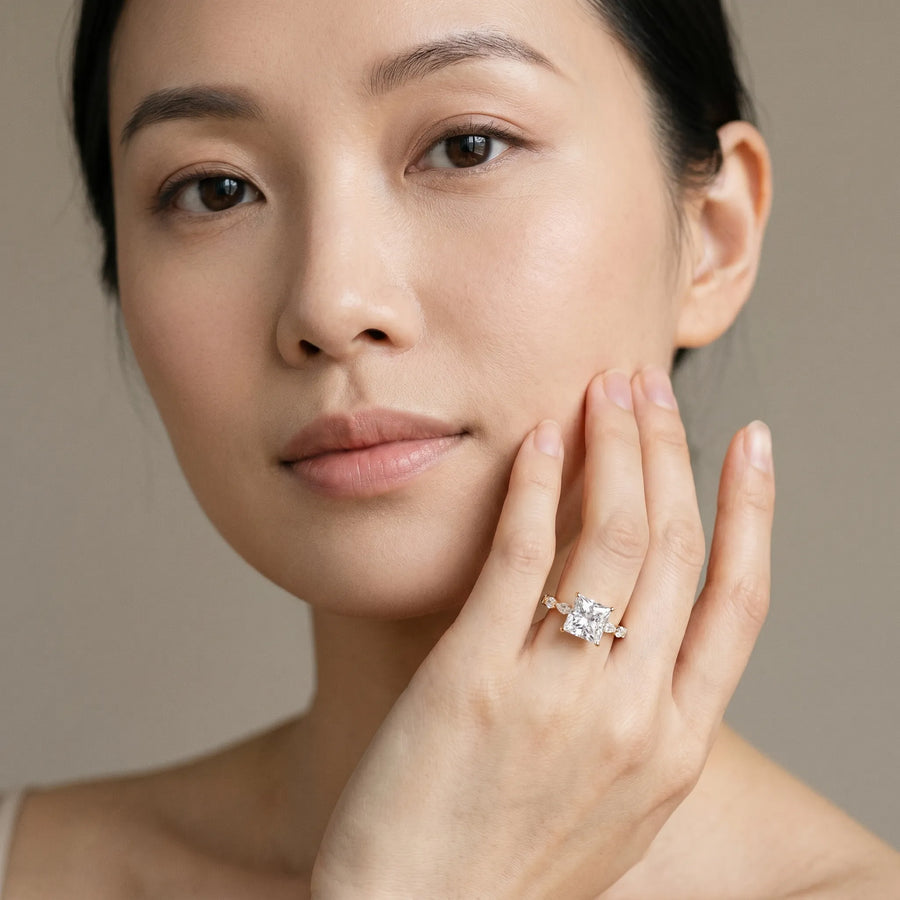 Yellow gold Princess Cut Diamond Ring with Marquise Side Stones and Prong Setting