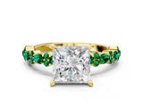 Yellow gold Princess Cut Diamond Side Stone Solitaire Ring with Round with Emerald side stone and Four-Prong Setting