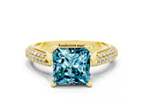 Yellow gold Princess Cut Diamond Solitaire Engagement Ring with Pavé Band and Four-Prong Setting