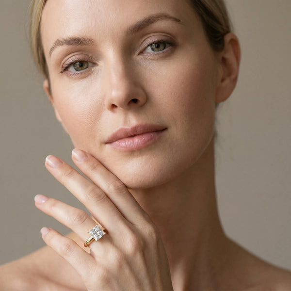 Yellow gold Princess Cut Diamond Solitaire Engagement Ring with Round Band and Four-Prong Setting