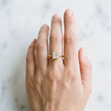 Yellow gold Princess Cut Diamond Solitaire Ring with Flower Prong Setting and Classic Band