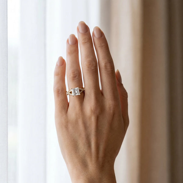 Yellow gold Princess Cut Diamond Solitaire Ring with Four-Prong Setting and Twisted Pavé Band