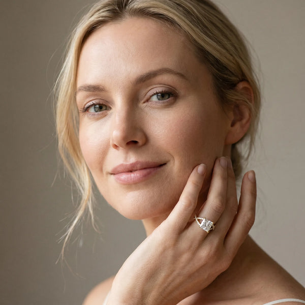 Yellow gold Princess Cut Diamond Solitaire Ring with Four-Prong Setting and Twisted Pavé Band
